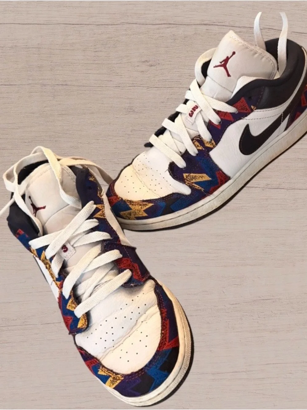 Jordan Low Top Sneakers in White with Black and Multicolor Accents